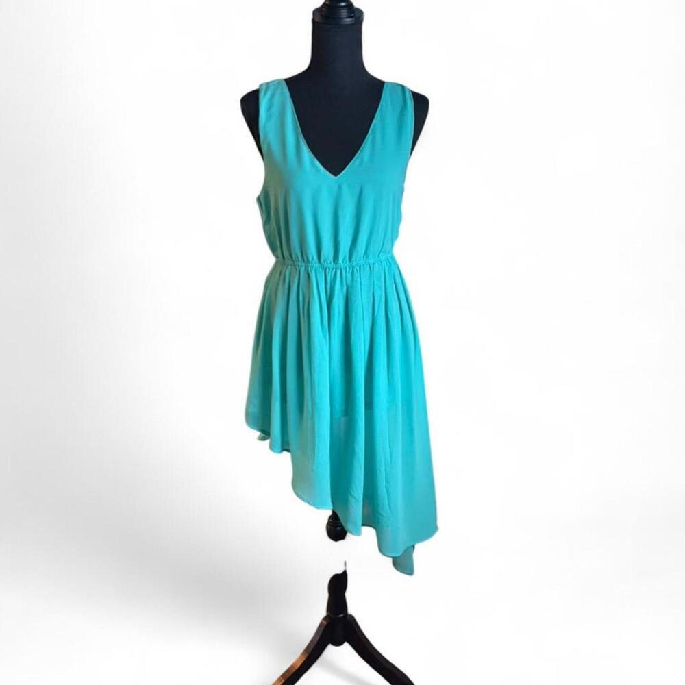 James Lacroix turquoise dress with asymmetrical hem